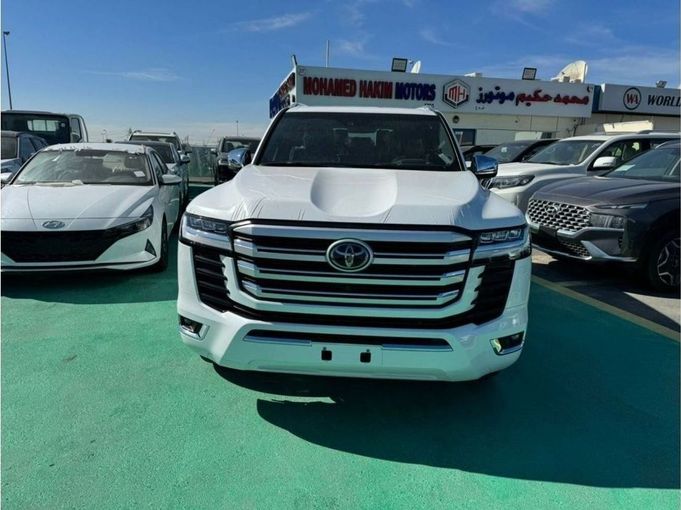 New Toyota Land Cruiser 300 Series, 3.4 l, 2023 in Dubai by Mohamed Hakim Motors, White color. GCC Specs | AUTO.AE