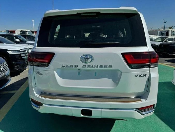 New Toyota Land Cruiser 300 Series, 3.4 l, 2023 in Dubai by Mohamed Hakim Motors, White color. GCC Specs | AUTO.AE