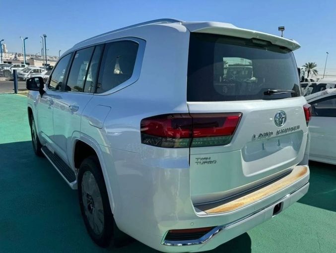 New Toyota Land Cruiser 300 Series, 3.4 l, 2023 in Dubai by Mohamed Hakim Motors, White color. GCC Specs | AUTO.AE