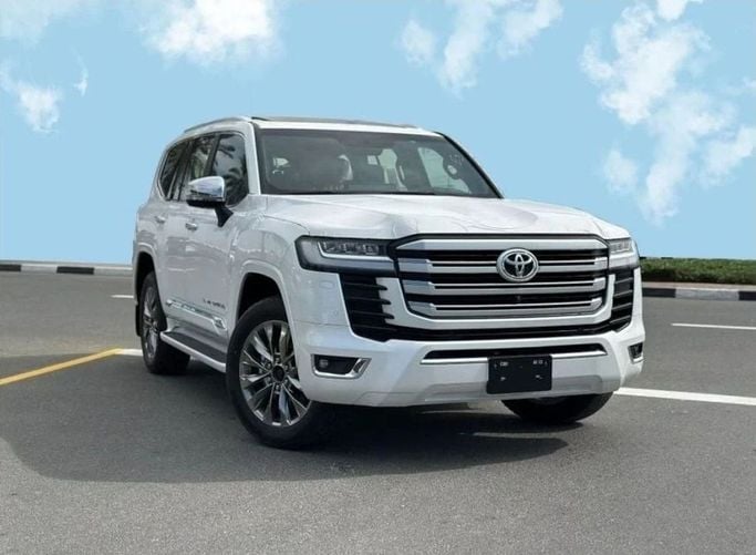 New Toyota Land Cruiser 300 Series, 3.4 l, 2024 in Dubai by Mohamed Hakim Motors, White color. GCC Specs | AUTO.AE