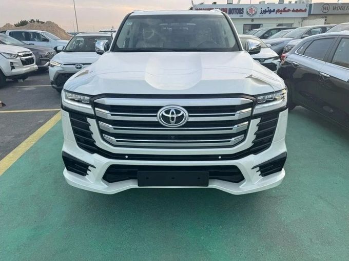 New Toyota Land Cruiser 300 Series, 3.3 l, 2024 in Dubai by Mohamed Hakim Motors, White color. GCC Specs | AUTO.AE