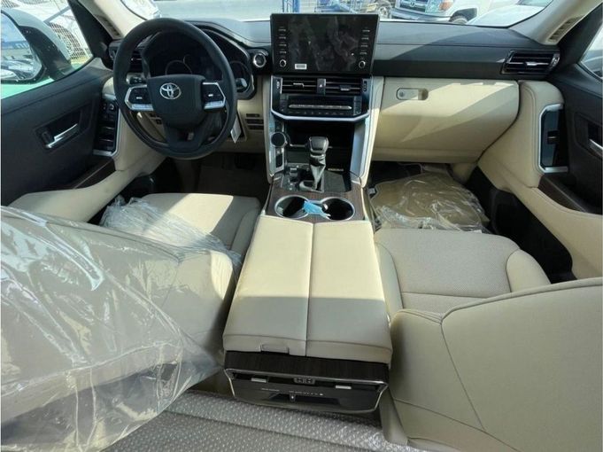 New Toyota Land Cruiser 300 Series, 4.0 l, 2023 in Dubai by Mohamed Hakim Motors, White color. GCC Specs | AUTO.AE