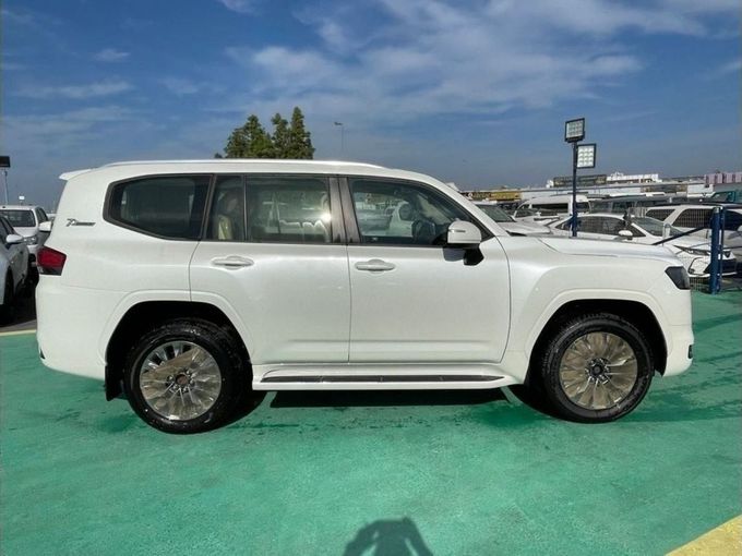 New Toyota Land Cruiser 300 Series, 4.0 l, 2023 in Dubai by Mohamed Hakim Motors, White color. GCC Specs | AUTO.AE