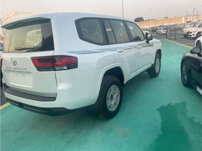 New Toyota Land Cruiser 300 Series, 4.0 l, 2023 in Dubai by Mohamed Hakim Motors, White color. GCC Specs | AUTO.AE
