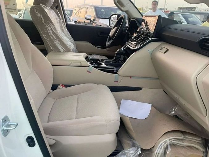 New Toyota Land Cruiser 300 Series, 4.0 l, 2023 in Dubai by Mohamed Hakim Motors, White color. GCC Specs | AUTO.AE