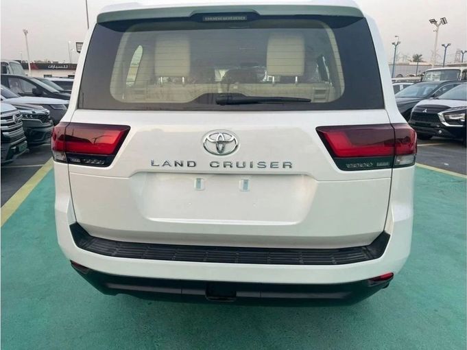 New Toyota Land Cruiser 300 Series, 4.0 l, 2023 in Dubai by Mohamed Hakim Motors, White color. GCC Specs | AUTO.AE