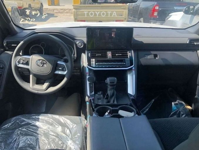 New Toyota Land Cruiser 300 Series, 4.0 l, 2024 in Dubai by Mohamed Hakim Motors, White color. GCC Specs | AUTO.AE