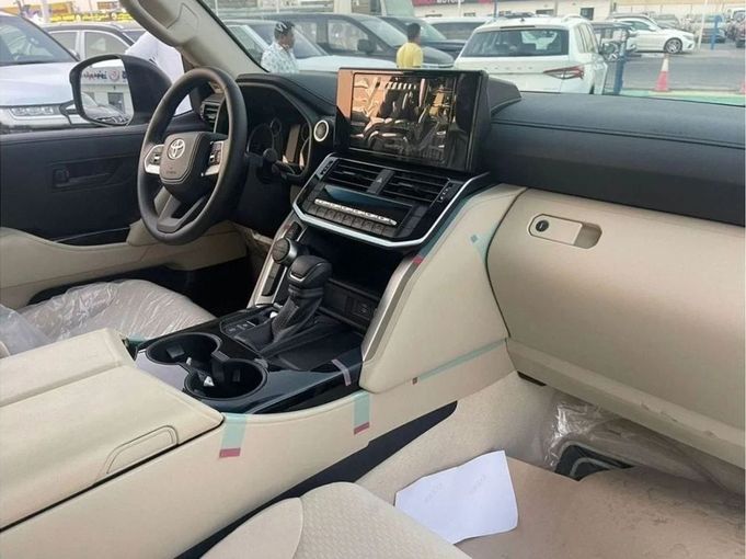 New Toyota Land Cruiser 300 Series, 4.0 l, 2024 in Dubai by Mohamed Hakim Motors, White color. GCC Specs | AUTO.AE