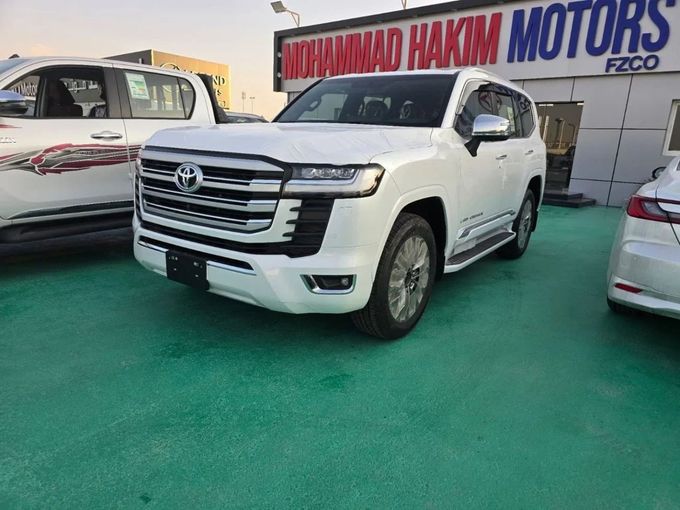 New Toyota Land Cruiser 300 Series, 4.0 l, 2024 in Dubai by Mohamed Hakim Motors, White color. GCC Specs | AUTO.AE