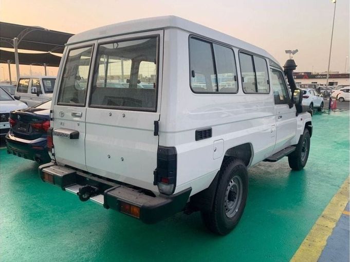 New Toyota Land Cruiser 70 Series Facelift 2, 4.0 l, 2024 in Dubai by Mohamed Hakim Motors, White color. GCC Specs | AUTO.AE
