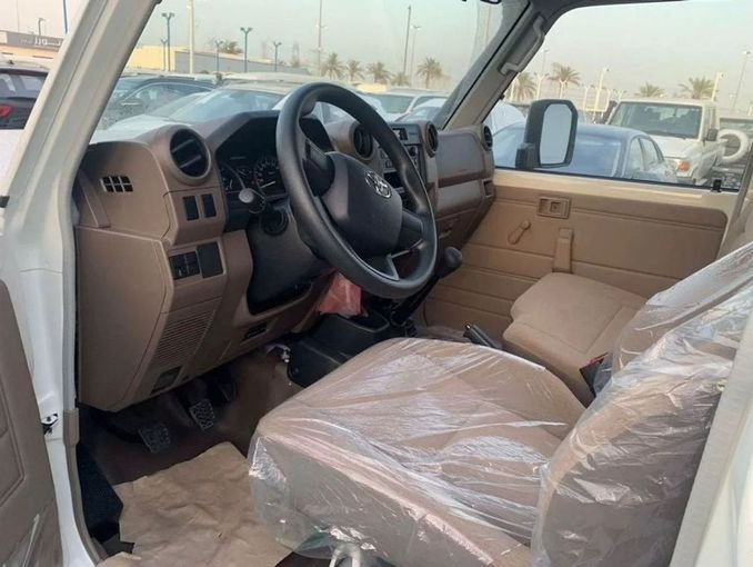 New Toyota Land Cruiser 70 Series Facelift 2, 4.0 l, 2024 in Dubai by Mohamed Hakim Motors, White color. GCC Specs | AUTO.AE