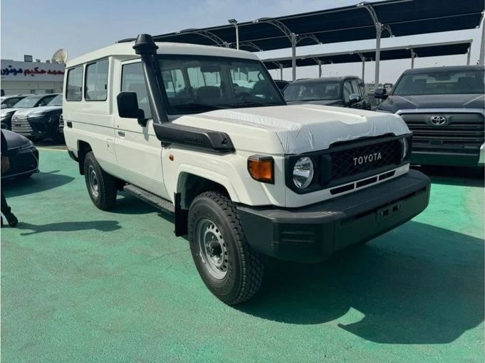 New Toyota Land Cruiser 70 Series Facelift 2, 4.5 l, 2024 in Dubai by Mohamed Hakim Motors, White color. GCC Specs | AUTO.AE