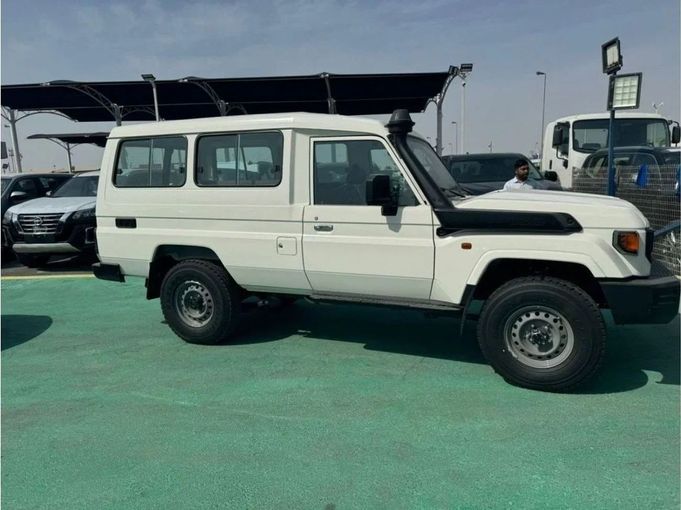 New Toyota Land Cruiser 70 Series Facelift 2, 4.5 l, 2024 in Dubai by Mohamed Hakim Motors, White color. GCC Specs | AUTO.AE