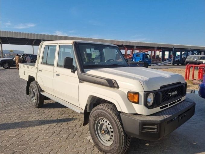 New Toyota Land Cruiser 70 Series Facelift 2, 4.5 l, 2024 in Dubai by Mohamed Hakim Motors, White color. GCC Specs | AUTO.AE