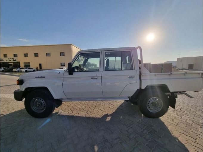 New Toyota Land Cruiser 70 Series Facelift 2, 4.5 l, 2024 in Dubai by Mohamed Hakim Motors, White color. GCC Specs | AUTO.AE