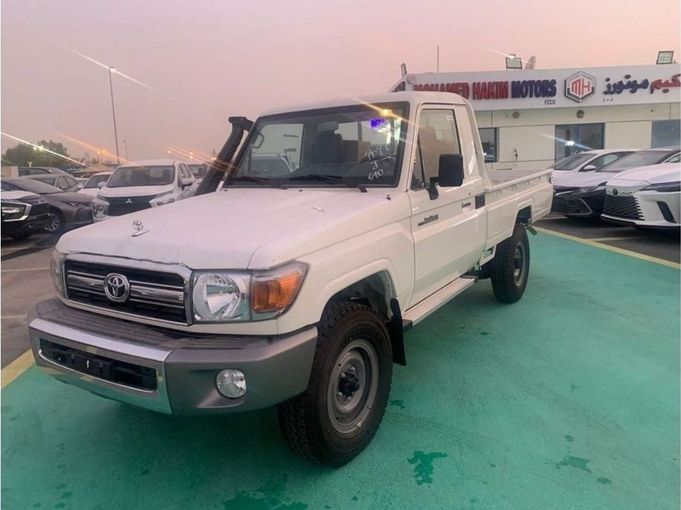 New Toyota Land Cruiser 70 Series Facelift, 4.2 l, 2023 in Dubai by Mohamed Hakim Motors, White color. GCC Specs | AUTO.AE