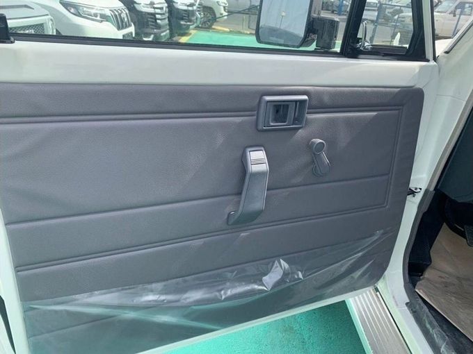 New Toyota Land Cruiser 70 Series Facelift, 4.2 l, 2023 in Dubai by Mohamed Hakim Motors, White color. GCC Specs | AUTO.AE