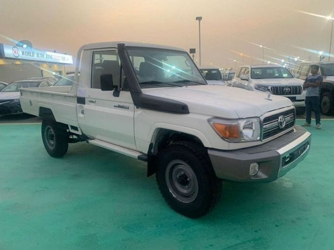 New Toyota Land Cruiser 70 Series Facelift, 4.2 l, 2023 in Dubai by Mohamed Hakim Motors, White color. GCC Specs | AUTO.AE