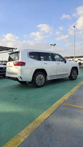 New Toyota Land Cruiser 300 Series, 3.4 l, 2025 in Dubai by Mohamed Hakim Motors, White color. GCC Specs | AUTO.AE