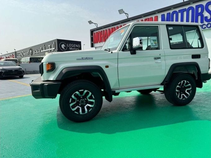 New Toyota Land Cruiser 70 Series Facelift 2, 4.0 l, 2024 in Dubai by Mohamed Hakim Motors, White color. GCC Specs | AUTO.AE