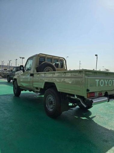 New Toyota Land Cruiser 70 Series Facelift 2, 4.0 l, 2024 in Dubai by Mohamed Hakim Motors, Bronze color. GCC Specs | AUTO.AE