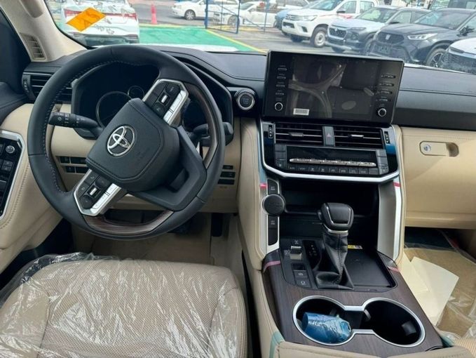 New Toyota Land Cruiser 300 Series, 4.0 l, 2024 in Dubai by Mohamed Hakim Motors, White color. GCC Specs | AUTO.AE