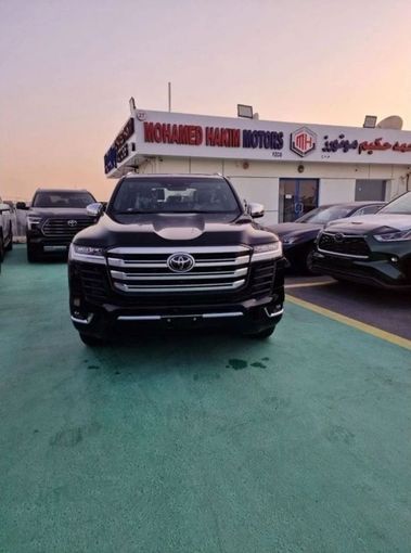 New Toyota Land Cruiser 300 Series, 3.4 l, 2023 in Dubai by Mohamed Hakim Motors, Black color. GCC Specs | AUTO.AE