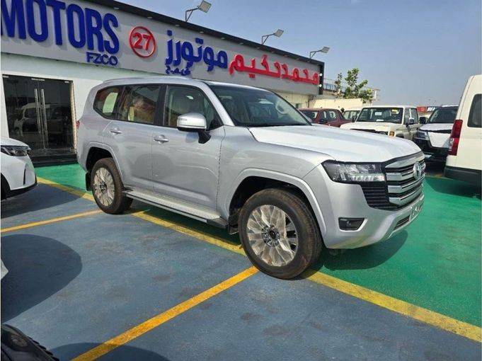 New Toyota Land Cruiser 300 Series, 4.0 l, 2024 in Dubai by Mohamed Hakim Motors, Silver color. GCC Specs | AUTO.AE