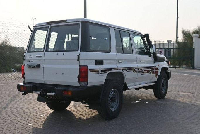 New Toyota Land Cruiser 70 Series Facelift 2, 4.5 l, 2024 in Dubai by Mohamed Hakim Motors, White color. GCC Specs | AUTO.AE