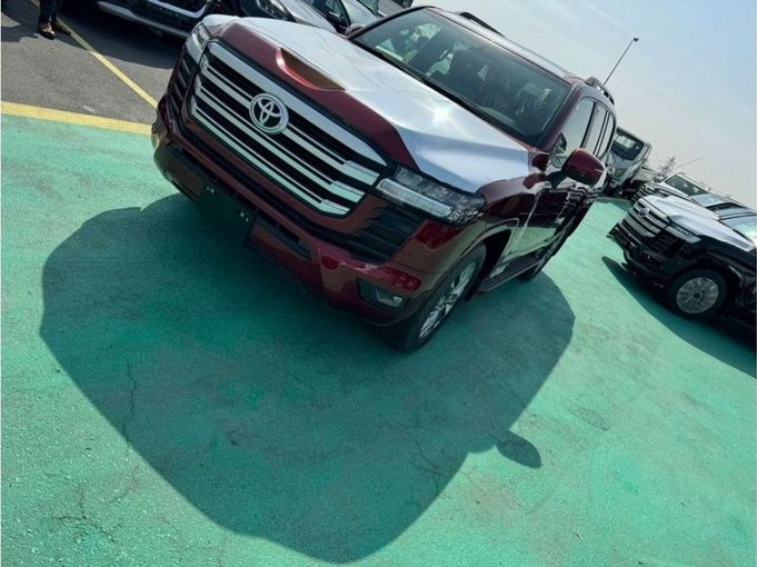 New Toyota Land Cruiser 300 Series, 3.3 l, 2023 in Dubai by Mohamed Hakim Motors, Red color. GCC Specs | AUTO.AE