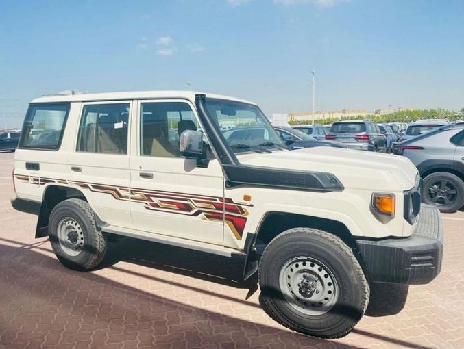 New Toyota Land Cruiser 70 Series Facelift 2, 4.5 l, 2024 in Dubai by Mohamed Hakim Motors, White color. GCC Specs | AUTO.AE