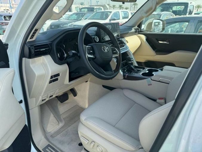 New Toyota Land Cruiser 300 Series, 4.0 l, 2023 in Dubai by Mohamed Hakim Motors, White color. GCC Specs | AUTO.AE