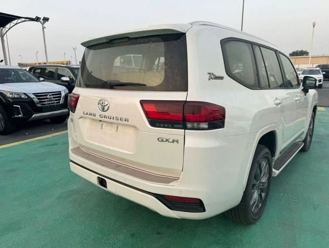 New Toyota Land Cruiser 300 Series, 3.3 l, 2023 in Dubai by Mohamed Hakim Motors, White color. GCC Specs | AUTO.AE
