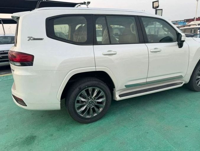 New Toyota Land Cruiser 300 Series, 3.3 l, 2023 in Dubai by Mohamed Hakim Motors, White color. GCC Specs | AUTO.AE