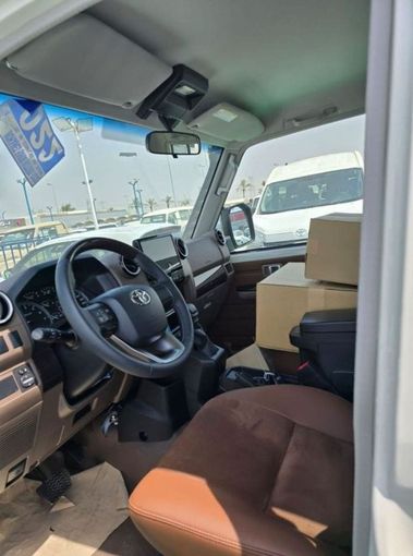 New Toyota Land Cruiser 70 Series Facelift 2, 4.0 l, 2024 in Dubai by Mohamed Hakim Motors, White color. GCC Specs | AUTO.AE