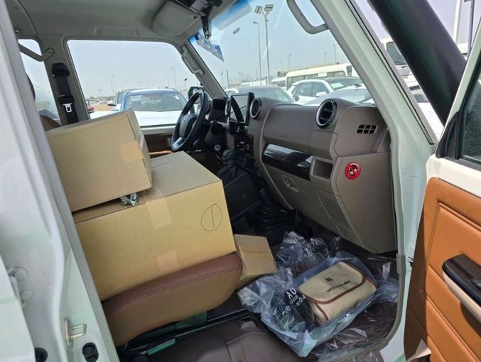 New Toyota Land Cruiser 70 Series Facelift 2, 4.0 l, 2024 in Dubai by Mohamed Hakim Motors, White color. GCC Specs | AUTO.AE