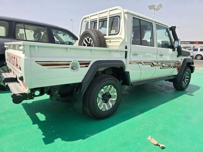 New Toyota Land Cruiser 70 Series Facelift 2, 4.0 l, 2024 in Dubai by Mohamed Hakim Motors, White color. GCC Specs | AUTO.AE