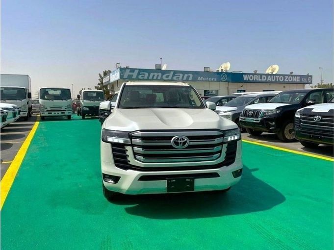 New Toyota Land Cruiser 300 Series, 3.3 l, 2023 in Dubai by Mohamed Hakim Motors, White color. GCC Specs | AUTO.AE