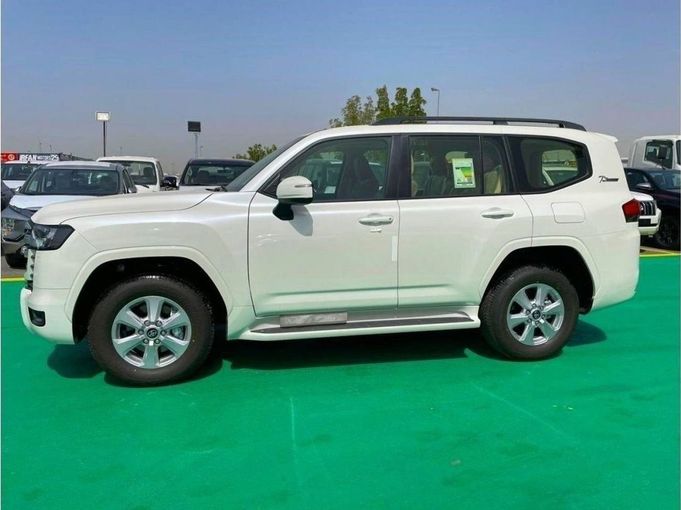 New Toyota Land Cruiser 300 Series, 3.3 l, 2023 in Dubai by Mohamed Hakim Motors, White color. GCC Specs | AUTO.AE