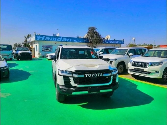 New Toyota Land Cruiser 300 Series, 3.4 l, 2023 in Dubai by Mohamed Hakim Motors, White color. GCC Specs | AUTO.AE