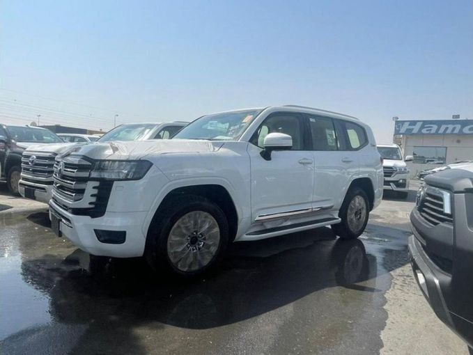 New Toyota Land Cruiser 300 Series, 3.4 l, 2023 in Dubai by Mohamed Hakim Motors, White color. GCC Specs | AUTO.AE