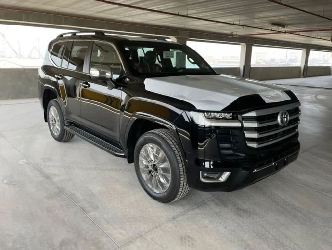 New Toyota Land Cruiser 300 Series, 4.0 l, 2023 in Dubai by Mohamed Hakim Motors, Black color. GCC Specs | AUTO.AE