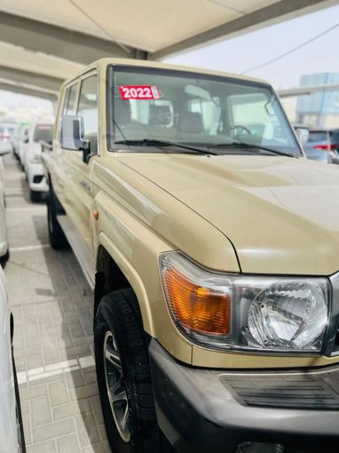 New Toyota Land Cruiser 70 Series Facelift, 4.0 l, 2022 in Dubai by Mohamed Hakim Motors, Beige color. GCC Specs | AUTO.AE