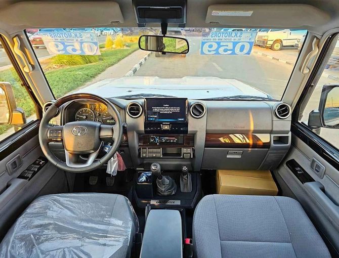 New Toyota Land Cruiser 70 Series Facelift 2, 4.0 l, 2024 in Dubai by SK Motors, Black color. GCC Specs | AUTO.AE