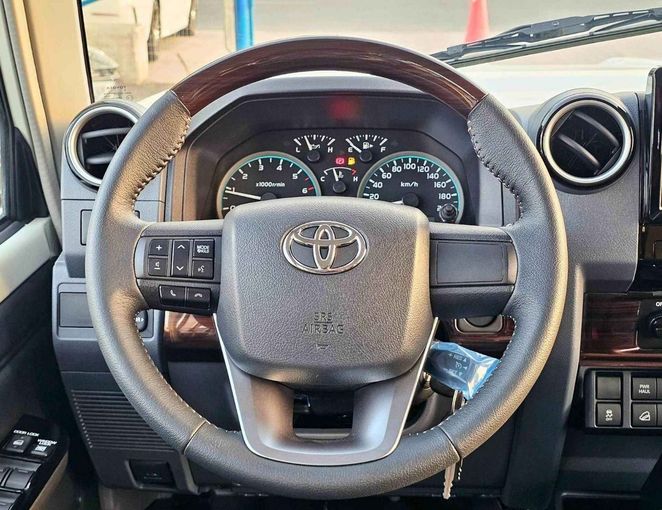 New Toyota Land Cruiser 70 Series Facelift 2, 4.0 l, 2025 in Dubai by SK Motors, White color. GCC Specs | AUTO.AE