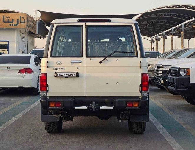 New Toyota Land Cruiser 70 Series Facelift 2, 4.0 l, 2024 in Dubai by SK Motors, White color. GCC Specs | AUTO.AE