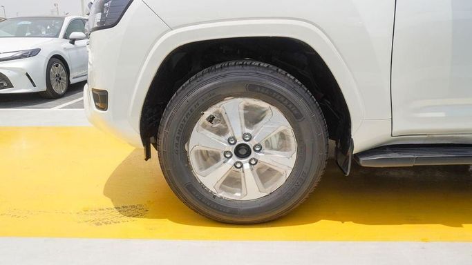 New Toyota Land Cruiser 300 Series, 3.4 l, 2025 in Dubai by Najem Motors, White color. GCC Specs | AUTO.AE