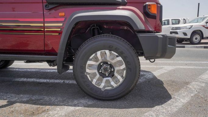 New Toyota Land Cruiser 70 Series Facelift 2, 4.0 l, 2025 in Dubai by Najem Motors, Red color. GCC Specs | AUTO.AE