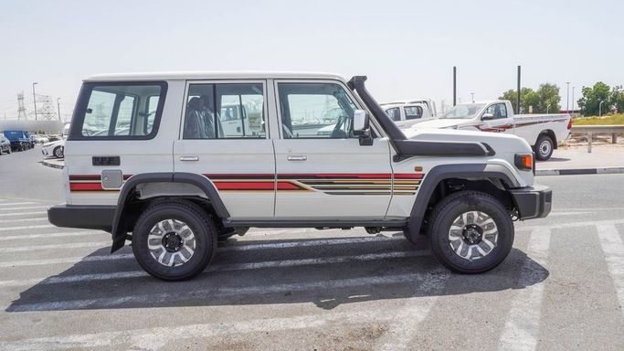 New Toyota Land Cruiser 70 Series Facelift 2, 4.0 l, 2025 in Dubai by Najem Motors, White color. GCC Specs | AUTO.AE