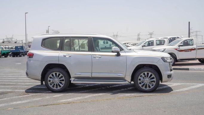 New Toyota Land Cruiser 300 Series, 3.4 l, 2024 in Dubai by Najem Motors, White color. GCC Specs | AUTO.AE